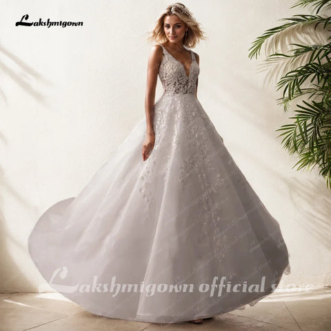 Lakshmigown – Robe de mariée sans manches à col en V pour femme, tenue de mariée romantique style bohème, avec perles et dentelle ivoire 