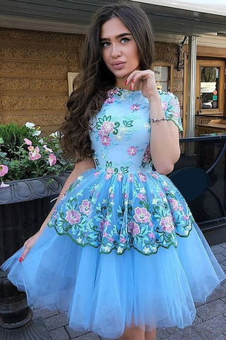 Vestidos de fiesta de bienvenida con estampado floral azul, manga corta y corte en A.
