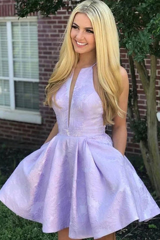 Vestidos florales para fiesta de bienvenida con bolsillo y escote halter.