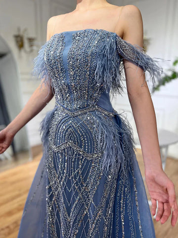 2025 Blue Mermaid Gown Luxury Feathers Beaded Saudi Evening Dress with Overlay Skirt for Formal Occasion LA72727