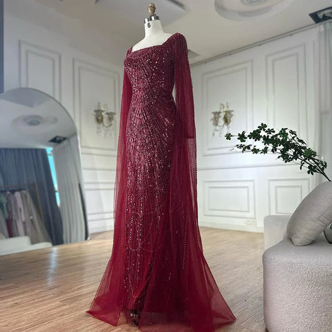 2025 Saudi Arabic Turquoise Mermaid Evening Dress With Pearls Beaded Cape Sleeves For Formal Occasion LA72590A