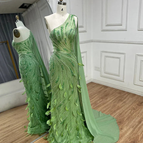 2025 Arabic Green One Shoulder Beaded Feathers Luxury Evening Gowns with Side Cape Shawl for Women's Party LA72698