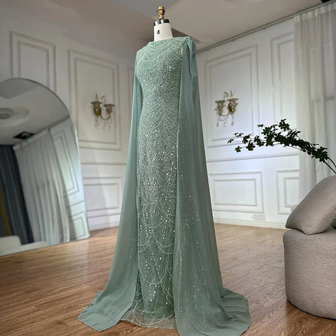 2025 Saudi Arabia Blue Mermaid Cape Sleeve Luxury Beaded Evening Gown for Formal Occasion LA72160A