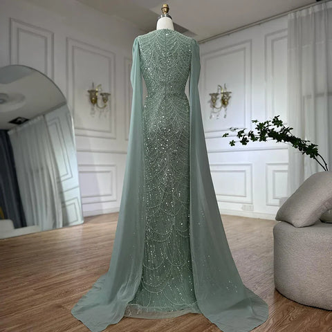 2025 Saudi Arabia Blue Mermaid Cape Sleeve Luxury Beaded Evening Gown for Formal Occasion LA72160A