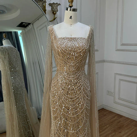 2025 Saudi Arabic Turquoise Mermaid Evening Dress With Pearls Beaded Cape Sleeves For Formal Occasion LA72590A