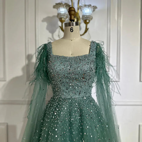 Robe de soirée de luxe saoudienne, coupe trapèze, bleu arabe, manches cape, perles, pour occasions formelles, 2025 LA71782A 