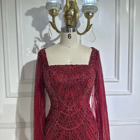 2025 Saudi Arabic Turquoise Mermaid Evening Dress With Pearls Beaded Cape Sleeves For Formal Occasion LA72590A