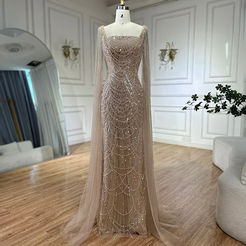 2025 Saudi Arabic Turquoise Mermaid Evening Dress With Pearls Beaded Cape Sleeves For Formal Occasion LA72590A