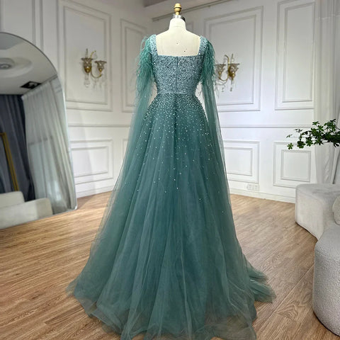 Robe de soirée de luxe saoudienne, coupe trapèze, bleu arabe, manches cape, perles, pour occasions formelles, 2025 LA71782A 