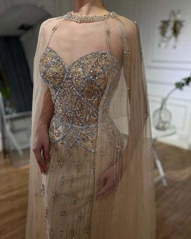 2025 Nude Saudi Evening Gown Mermaid Detachable Cape Sleeves Luxury Beaded Dress for Formal Occasion LA72716