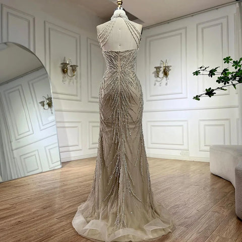 2025 Arabic Nude Halter Neck Mermaid Pearls Beaded Luxury Dubai Evening Gown for Women's Party LA72696