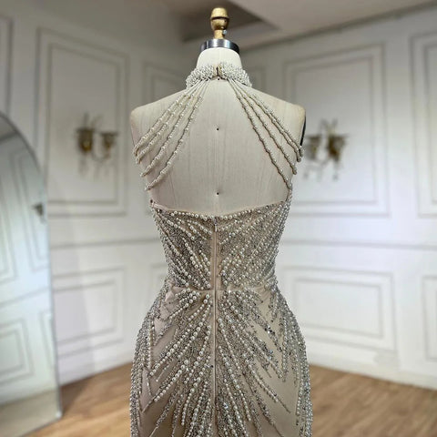 2025 Arabic Nude Halter Neck Mermaid Pearls Beaded Luxury Dubai Evening Gown for Women's Party LA72696