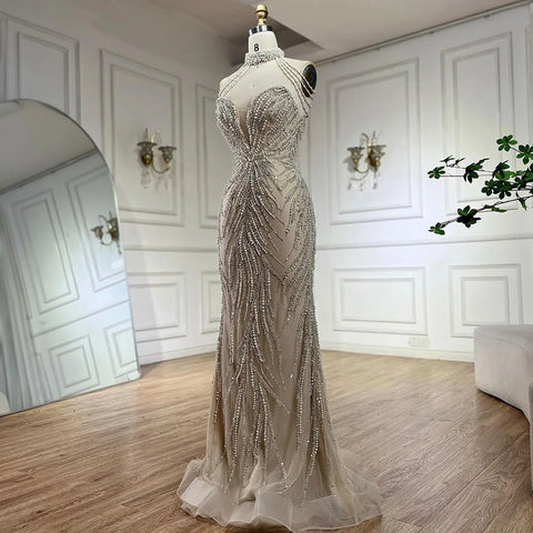 2025 Arabic Nude Halter Neck Mermaid Pearls Beaded Luxury Dubai Evening Gown for Women's Party LA72696