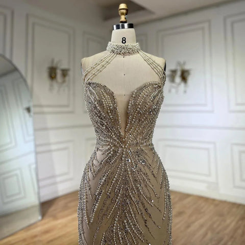 2025 Arabic Nude Halter Neck Mermaid Pearls Beaded Luxury Dubai Evening Gown for Women's Party LA72696