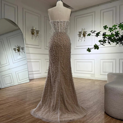 2025 Arabic White Nude Mermaid Gown Pearls Beading High Split Luxury Dubai Evening Dress for Women's Party LA72544