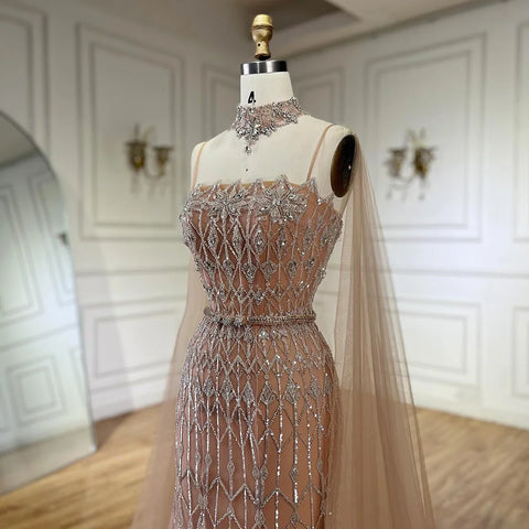 2025 Nude Beaded Spaghetti Strap Design Mermaid Evening Dresses Gowns with Long Cape for Formal Occasion LA72711