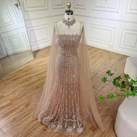 2025 Nude Beaded Spaghetti Strap Design Mermaid Evening Dresses Gowns with Long Cape for Formal Occasion LA72711