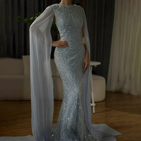 2025 Saudi Arabia Blue Mermaid Cape Sleeve Luxury Beaded Evening Gown for Formal Occasion LA72160A