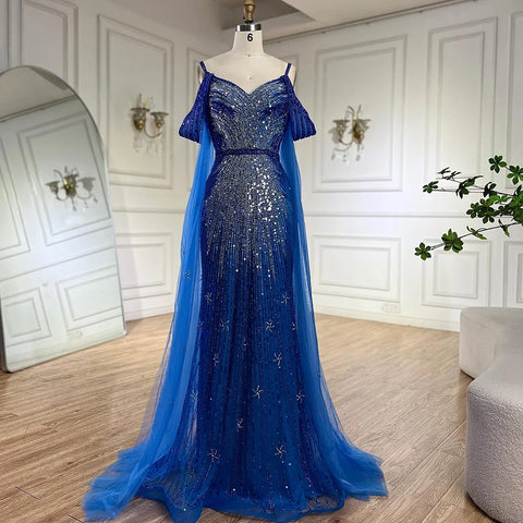 2025 Spaghetti Strap Blue Mermaid Beaded Luxury Evening Dress with Cape Sleeves for Formal Occasion Saudi LA72707