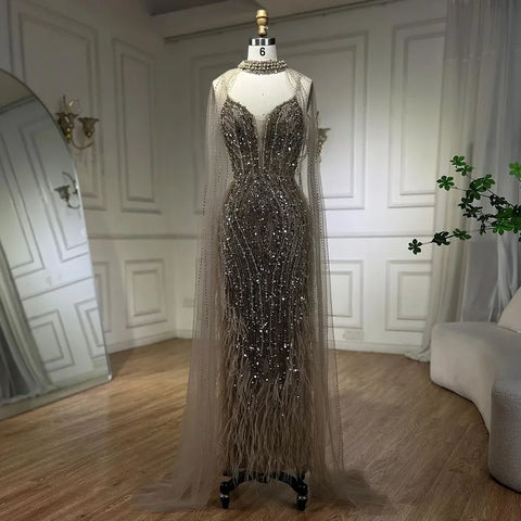 2025 White Nude Mermaid Wedding Party Dresses with Beaded Feathers Luxury Cape Sleeves  Party Gowns LA72047A