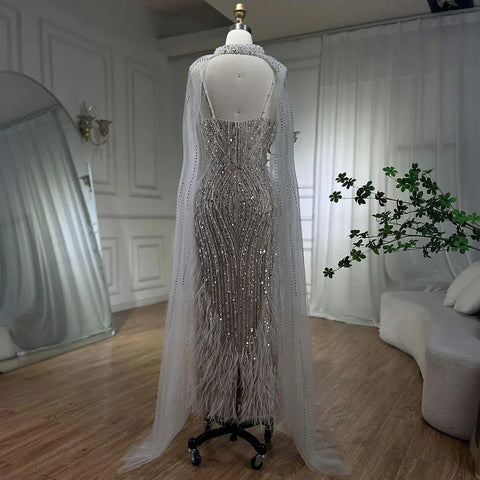 2025 White Nude Mermaid Wedding Party Dresses with Beaded Feathers Luxury Cape Sleeves  Party Gowns LA72047A