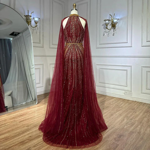 2025 Wine Red Beaded Mermaid Saudi Evening Dress with Cape for Formal Occasion LA72707A
