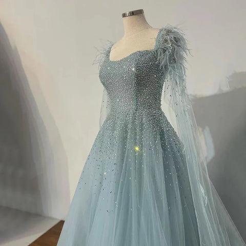 Robe de soirée de luxe saoudienne, coupe trapèze, bleu arabe, manches cape, perles, pour occasions formelles, 2025 LA71782A 
