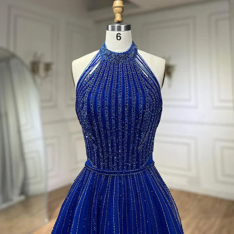 Robe de soirée élégante de style arabe bleu, coupe trapèze, luxueuse, à paillettes, perles et pompons, col licou, 2025 LA72227 