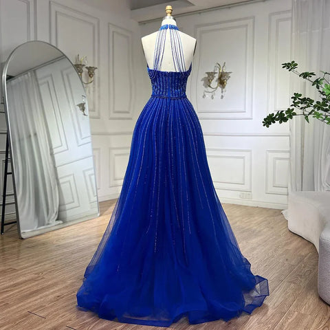 Robe de soirée élégante de style arabe bleu, coupe trapèze, luxueuse, à paillettes, perles et pompons, col licou, 2025 LA72227 