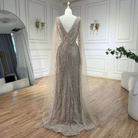 Vestidos de noche árabes de lujo color nude con mangas tipo capa, corte en A, con cuentas y estilo vestido para bodas y fiestas de mujeres 2025 LA72573 