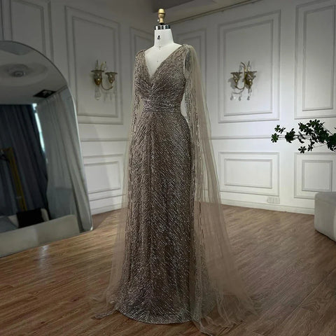 Vestidos de noche árabes de lujo color nude con mangas tipo capa, corte en A, con cuentas y estilo vestido para bodas y fiestas de mujeres 2025 LA72573 