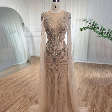 Vestidos de noche elegantes con cuentas, estilo sirena, color nude, con mangas tipo capa, de inspiración árabe. Vestidos de lujo para mujer, ideales para bodas y fiestas. Colección 2025. LA72165 