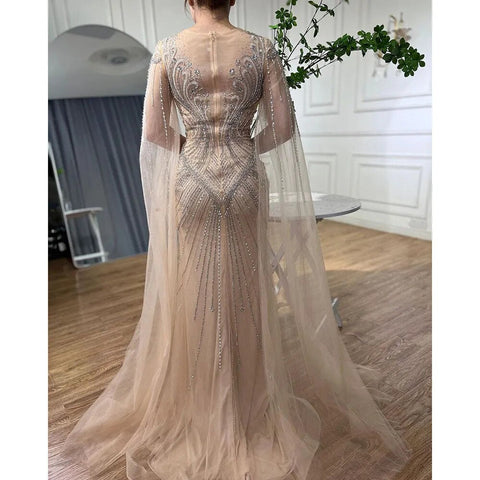 Vestidos de noche elegantes con cuentas, estilo sirena, color nude, con mangas tipo capa, de inspiración árabe. Vestidos de lujo para mujer, ideales para bodas y fiestas. Colección 2025. LA72165 