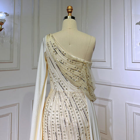Vestido de noche de lujo, elegante, de sirena, con un solo hombro, manga tipo capa, color beige, con cuentas, estilo 2025, para mujer, ideal para fiestas (LA71694) 