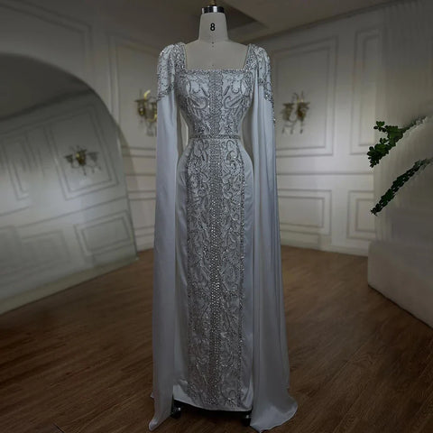 Vestidos de noche musulmanes de lujo color azul sirena con mangas tipo capa LA72050