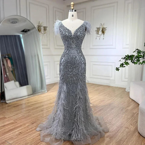 Vestidos de noche elegantes de sirena color champán, con plumas de diamantes, sin mangas, formales, de lujo, con cuentas 2025 LA70350 