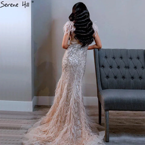 Vestidos de noche elegantes de sirena color champán, con plumas de diamantes, sin mangas, formales, de lujo, con cuentas 2025 LA70350 
