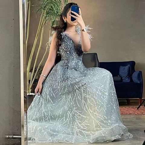 Vestidos de noche de lujo con plumas de Dubái 2025, sexys, con escote en V y cuentas azules, largos, formales, para mujer, boda, LA71805 