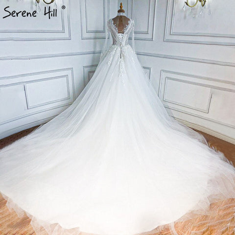 Robe de mariée musulmane de luxe ivoire 2025, coupe trapèze, robe de mariée de luxe perlée, HA2499, sur mesure 