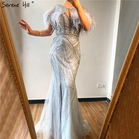 On Sale no return no refundSale Silver Feathers Shawl Yarn Sexy Evening Dresses 2025 Dubai Mermaid V-Neck Beading Diamond Formal Dress LA70355