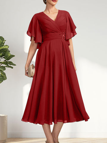 Vestido de corte A, escote en V, largo té, de gasa, para la madre de la novia, con plisados ​​y cuentas.