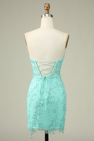 Robe de bal courte moulante vert clair à bustier cœur et corset ornée d'appliqués