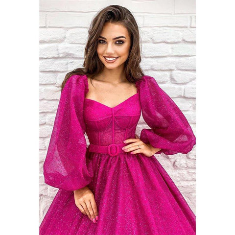 Robe de bal fuchsia scintillante à manches longues et coupe trapèze avec poches 