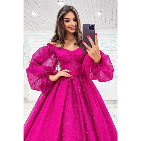 Robe de bal fuchsia scintillante à manches longues et coupe trapèze avec poches 