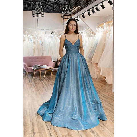 Robe de bal longue en tulle scintillant à bretelles spaghetti et poches 