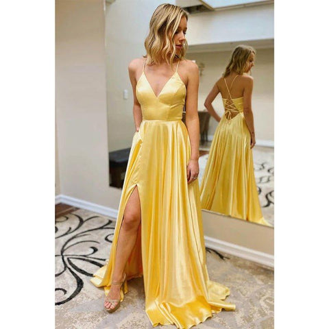 Robe de bal longue trapèze à col en V et bretelles spaghetti avec fente haute et poches 