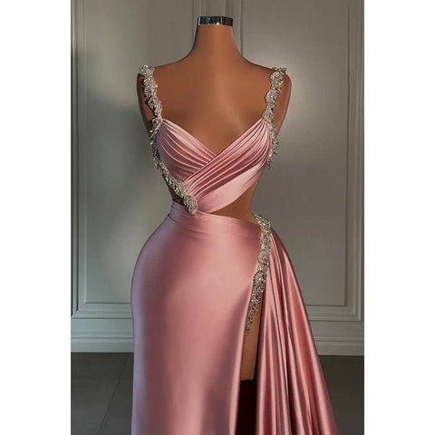 Elegante y lujoso vestido de fiesta de noche con escote en V, sin mangas y abertura.