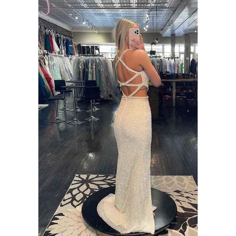 Vestido de fiesta largo con escote en V, lentejuelas, aberturas y tirantes cruzados