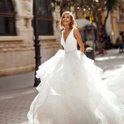 Robe de mariée sexy en organza, dos nu, coupe trapèze, décolleté en V, sans manches, bretelles spaghetti simples, pour la mariée 