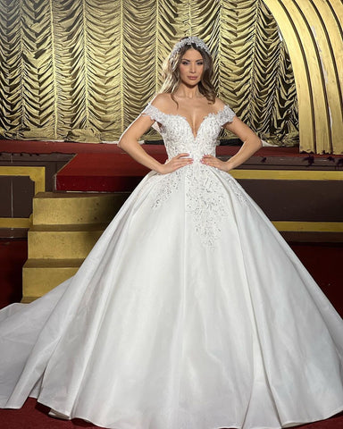 Charming Floor Length Off-The-Shoulder A Line Satin Wedding Dress with Ruffles
